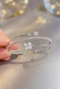 Elegant Crystal Leaf Stud Earrings - Shiny Silver Ear Piercings